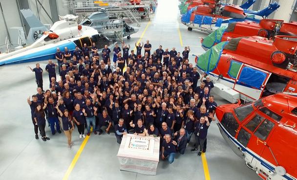 AH Romania Team members at Airbus Helicopters Romania mark Airbus’ 50th anniversary with a group photo.