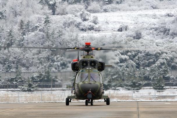 surion-prototype-first-flight On-ground, head-on view of a Surion utility transport helicopter developed by Airbus Helicopters and Korea Aerospace Industries.