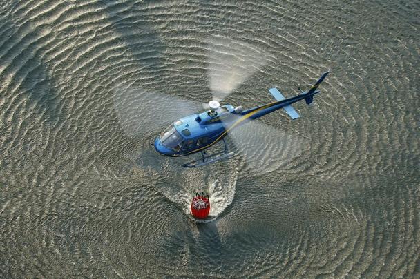 In firefighting operations, the Helicopter Transport Intervention Detachment involves carrying equipment, personnel, or water that will be emptied into reservoirs for the teams on the ground.