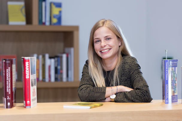 Ausbildung pupil Germany Ausbildung pupil on study programme, sitting at working desk