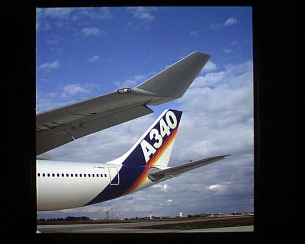 A340-300-Tail-and-wing-tip A340-300-Tail-and-wing-tip