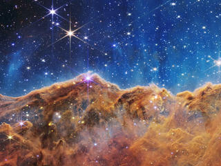 Carina Nebula taken by NIRCam Webbstory cosmic cliff