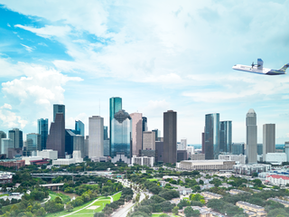 Hydrogen hub at airport ZEROe flying over the city of Houston
