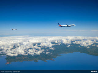 A350 flight test aircraft followed by DLR chase plane during ECLIF3 flight campaign