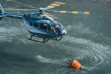 Airbus H145 loading water bucket Airbus H145 loading water bucket