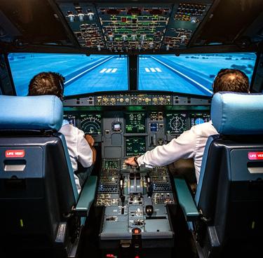 Pilot being trained on an Airbus FFS