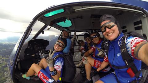 Five members of the Airbus-sponsored Ang’elles parachute team are ready for a group jump during international competition