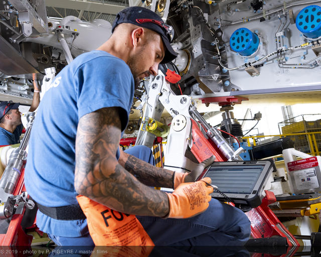 Airbus technician works on A350 FAL Airbus technician works on A350 FAL