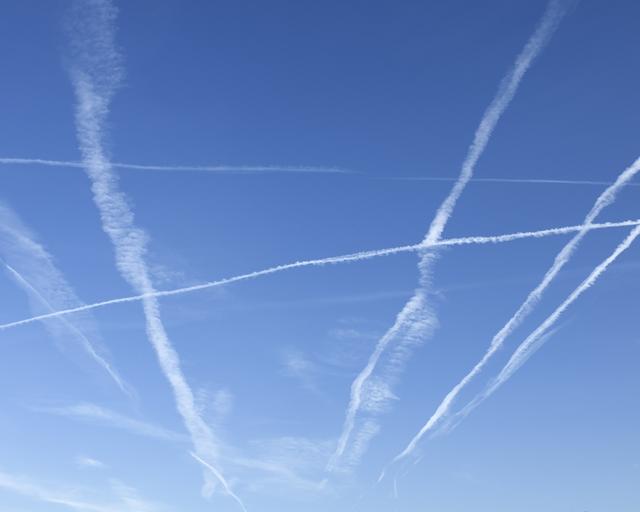 contrails on blue sky contrails on blue sky