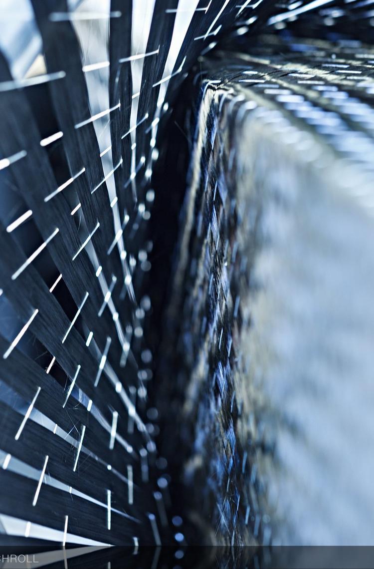 Composite carbon fiber weaving machine
