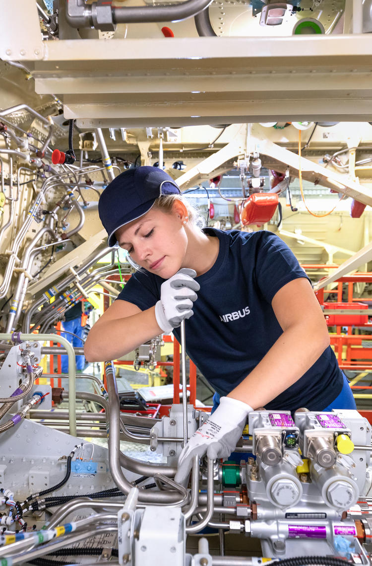 Young woman working as apprentice in Germany