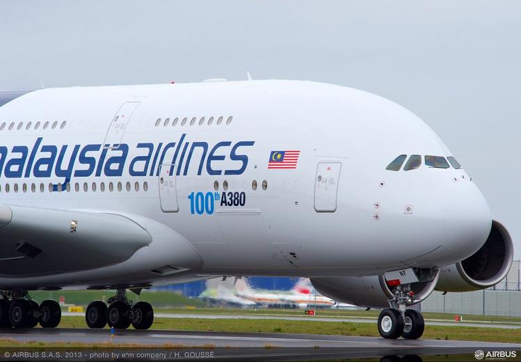On-ground photo of the 100th A380 aircraft produced by Airbus, delivered to Malaysia Airlines.