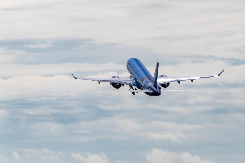 Breeze First A220 in the air