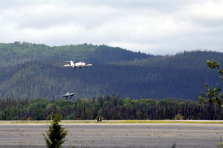 Barracuda flying in tandem with a Learjet